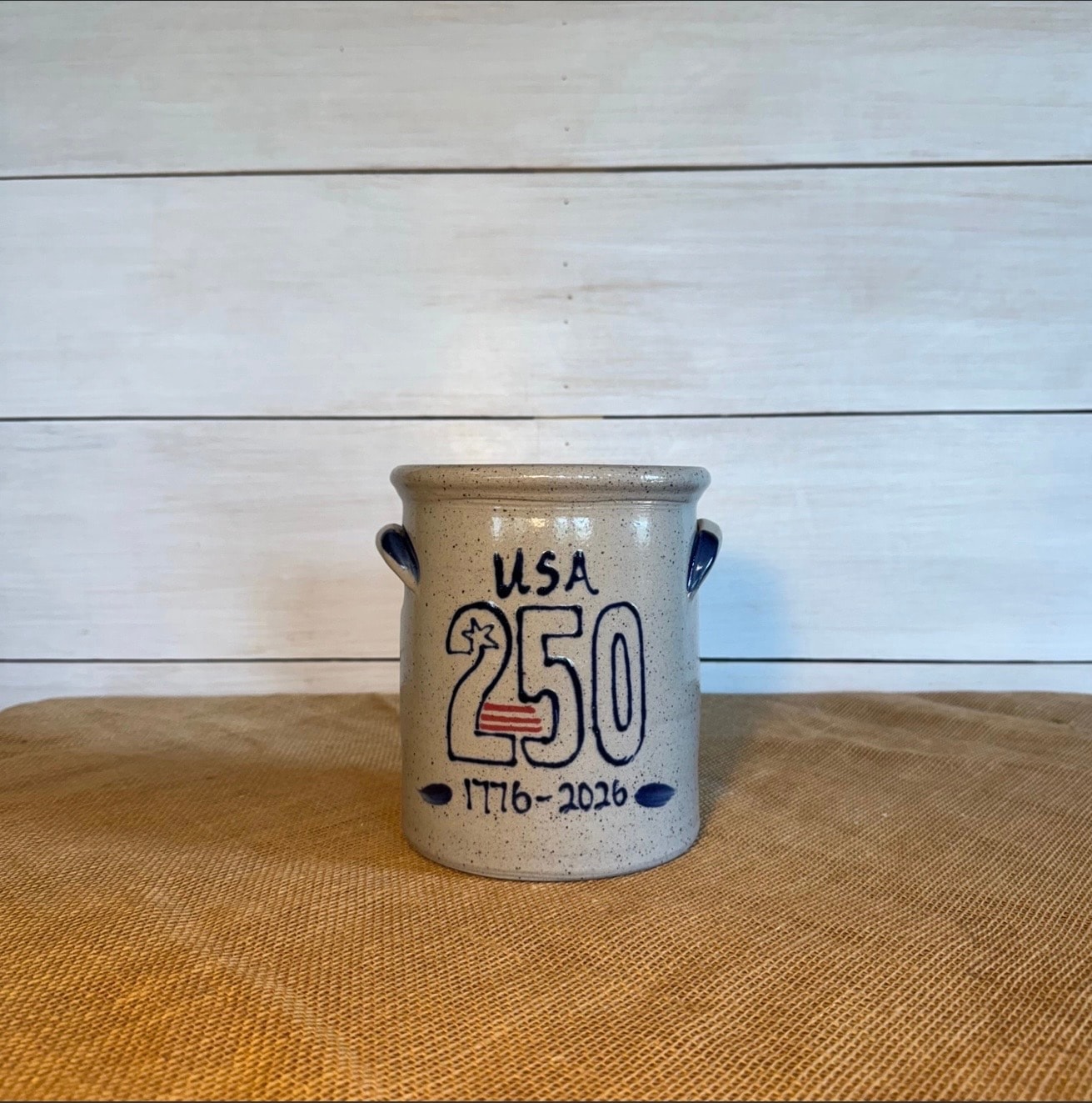 Rowe Pottery ceramic pieces — handmade stoneware mugs and bowls